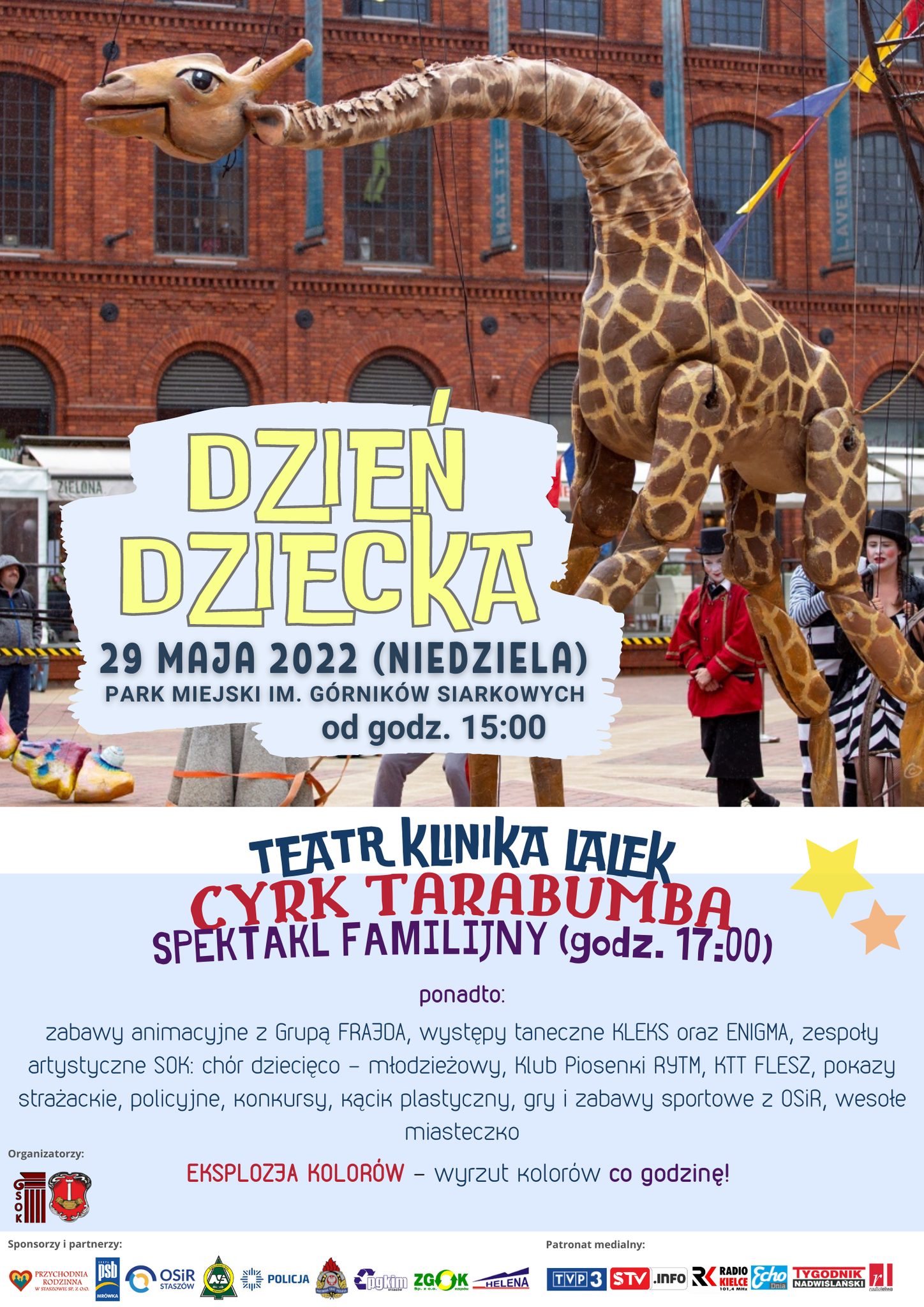 Plakat informacyjny: Dzień Dziecka. 29 maja od godz. 15:00, Park Miejski im. Górników Siarkowych. W programie: eksplozja kolorów, zabawy animacyjne z Grupą Frajda, zespoły taneczne KLEKS, spektakl pt. „Cyrk Tarabumba” w wykonaniu Teatru Klinika Lalek, Szkoła „Enigma”, Klub Tańca Towarzyskiego FLESZ, Klub Piosenki RYTM. Atrakcje dodatkowe: kąciki artystyczne (plastyczne, muzyczne SOK) i sportowe (OSiR), zabawy integracyjne, pokazy strażackie i policyjne, konkursy, wesołe miasteczko.